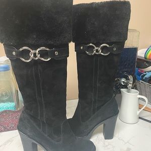Gently used coach suede boots with fur on top in excellent condition